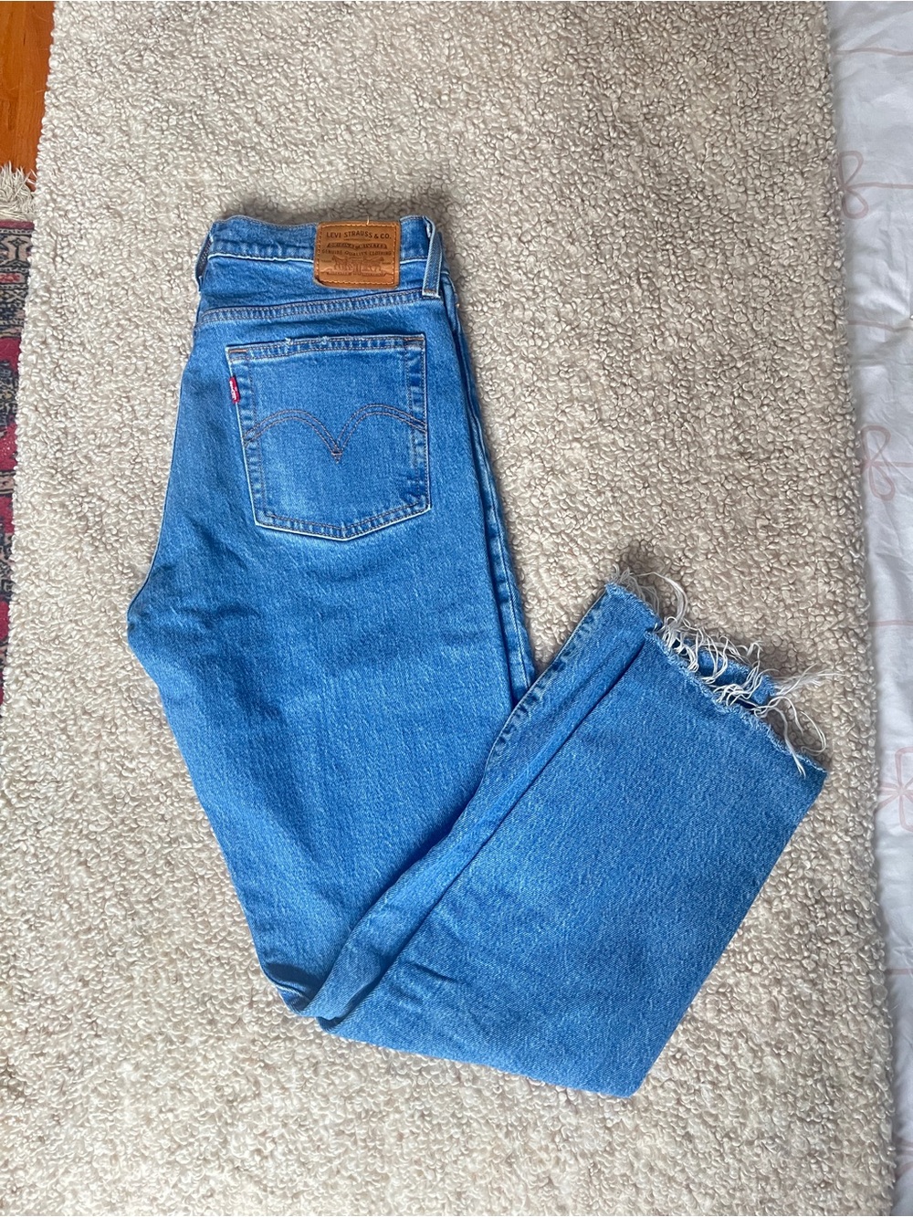Levi's Women's Medium Blue Straight Leg Jeans with Raw Hem
